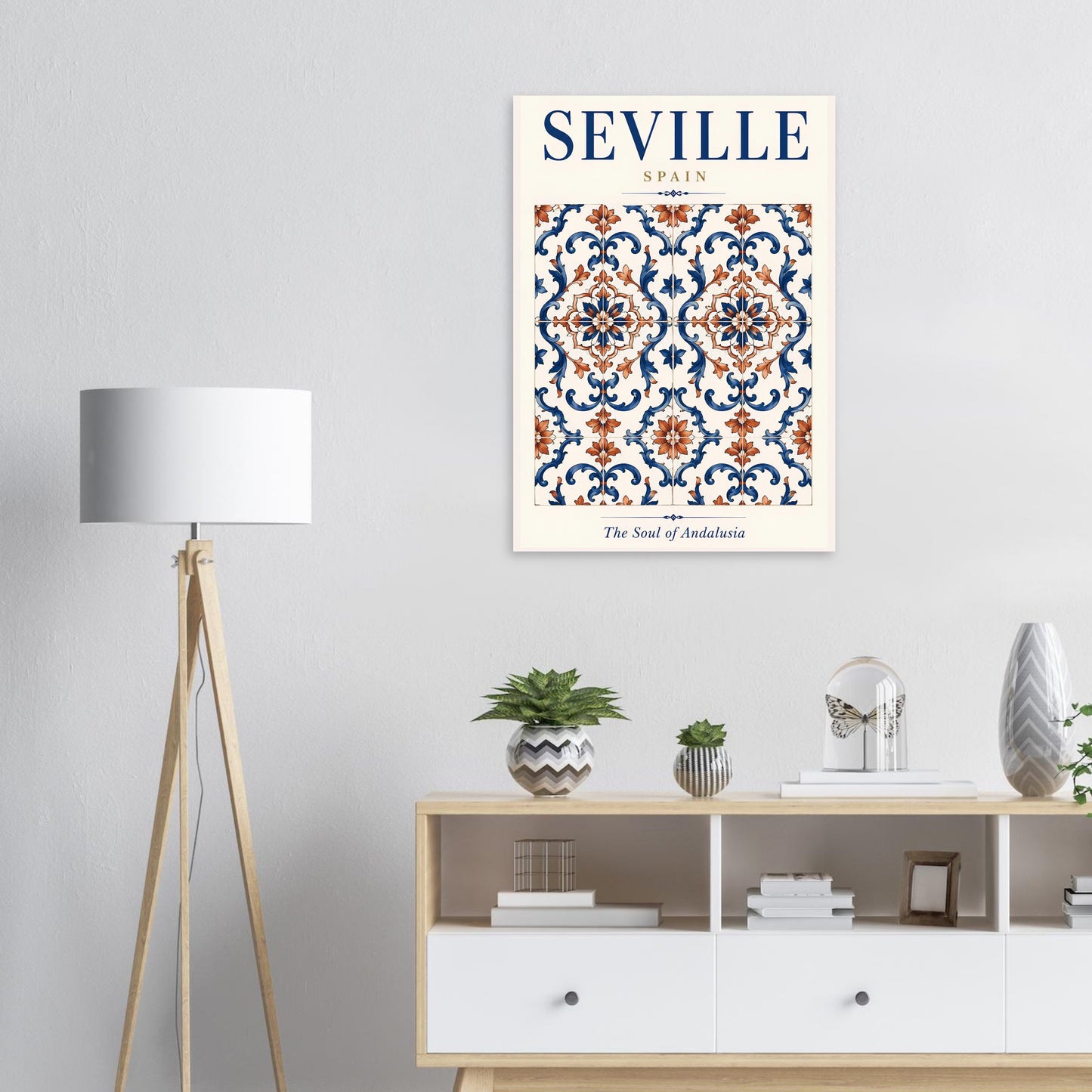 Seville tile poster displayed in a bright modern living space with a floor lamp, plants and neutral furniture.