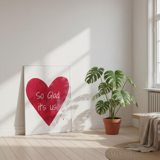 Room interior with a heart-shaped sign and potted plant