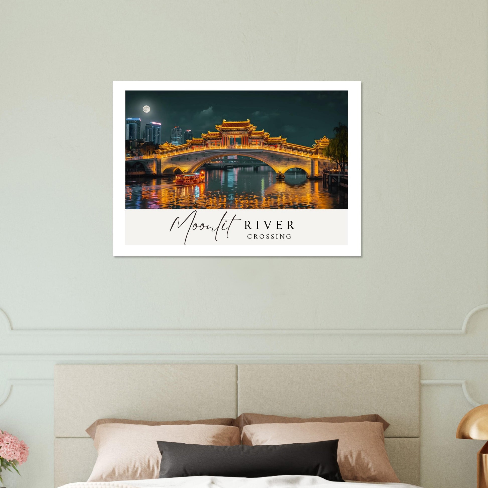 Framed artwork of a river scene with a bridge over a body of water, featuring the text 'Moonlit River Crossing'.