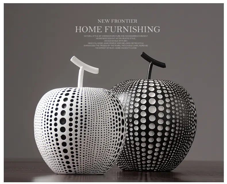 Decorative apple-shaped vases with black and white dot patterns on a gray background.