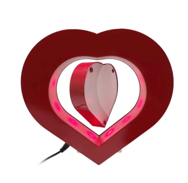 Heart-shaped lamp with a glowing interior on a white background