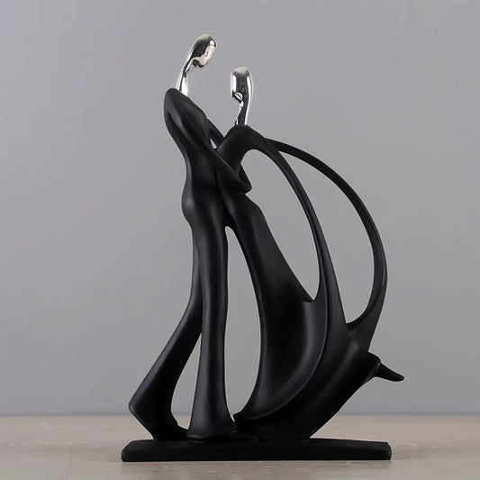 Black abstract sculpture on a gray background