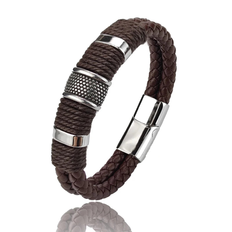 Brown braided bracelet with silver metal accents on a white background