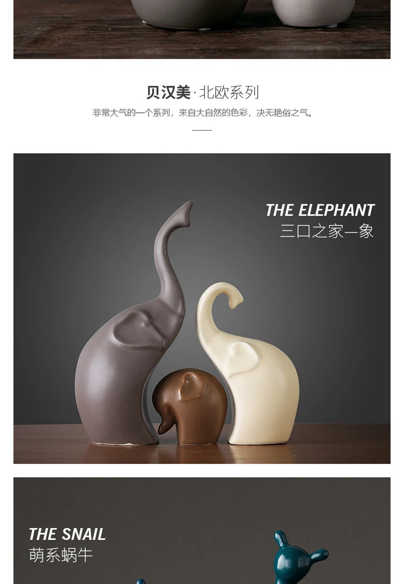 Decorative elephant figurines on a wooden surface with a dark background.