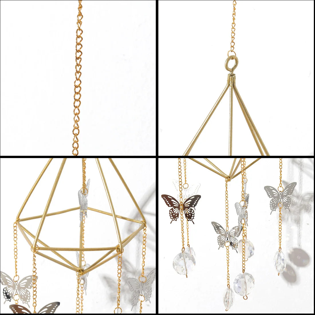 Gold geometric hanging ornament with butterfly and crystal decorations on a white background