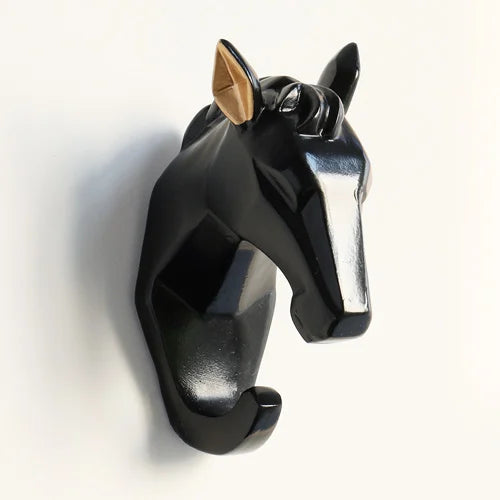 Black horse head wall decor on a white background