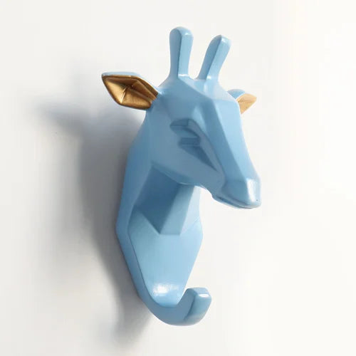 Blue deer-shaped wall hook with gold accents on a white background