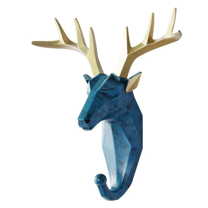Decorative deer head with gold antlers on a white background