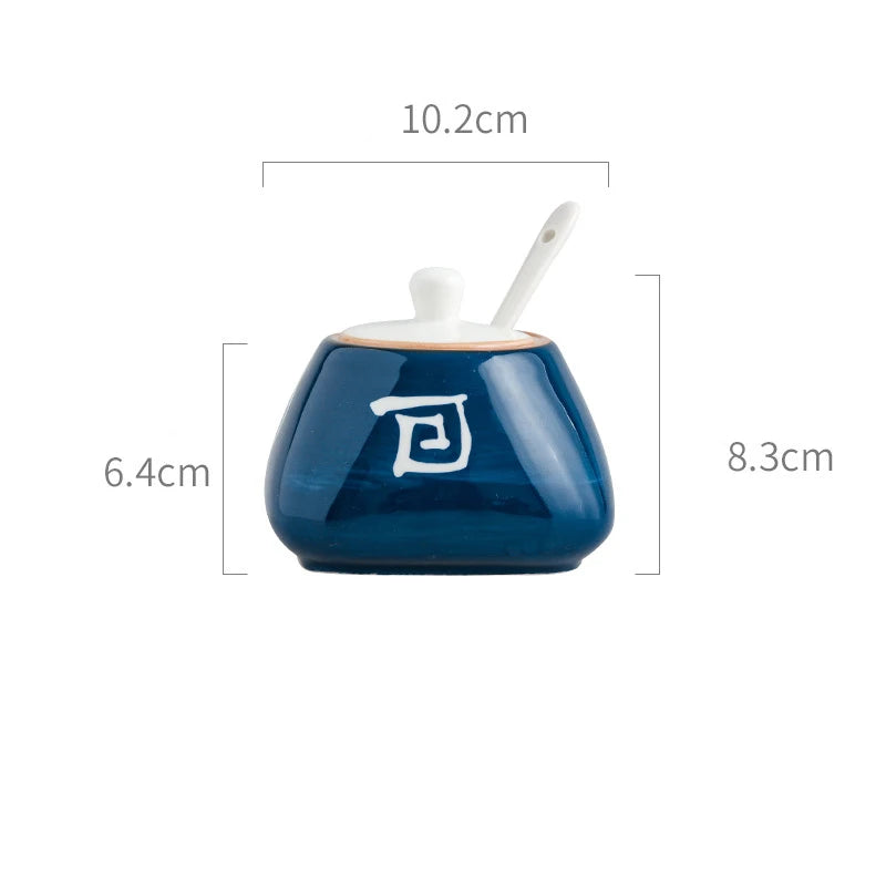 Blue ceramic container with spoon and measurements on a white background