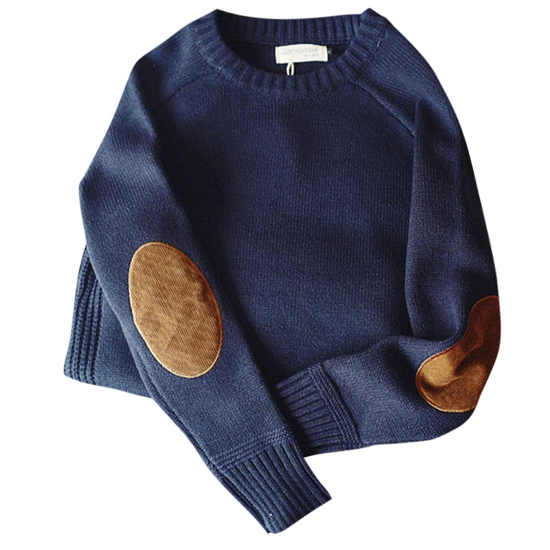 Blue sweater with brown elbow patches on a white background