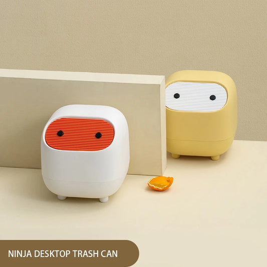 Two cute, cartoon-like desktop trash cans with a neutral background