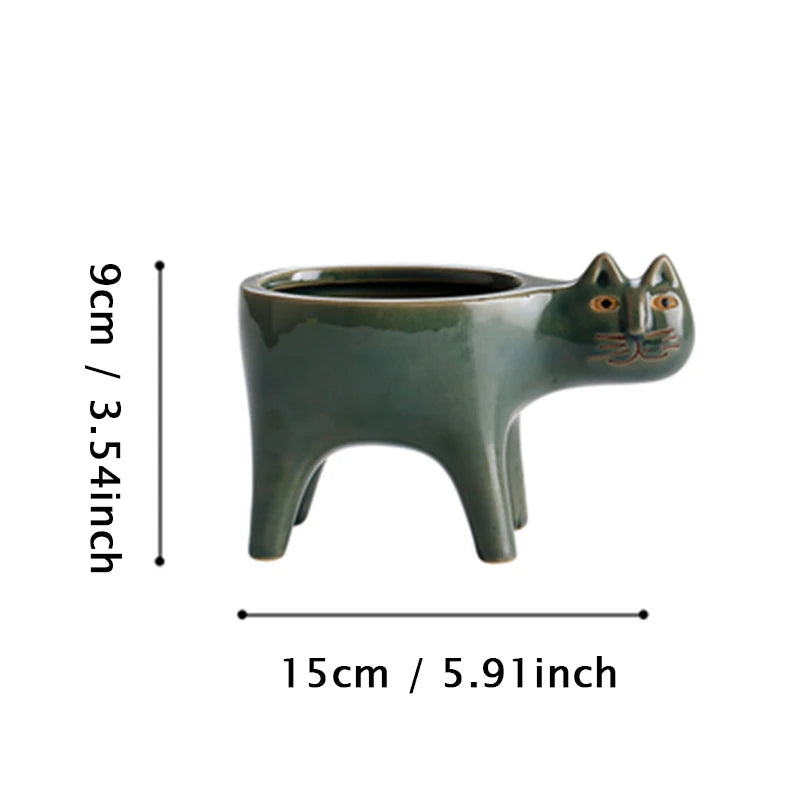 Cream and dark green ceramic cat planters size guide