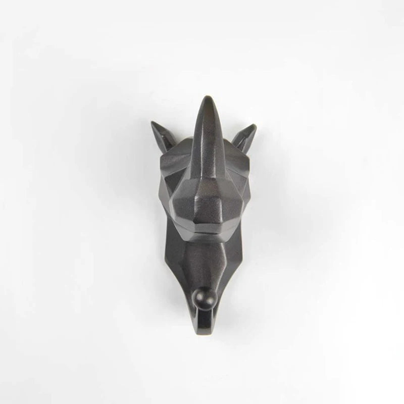 Black geometric Rhino head hook sculpture on a white background