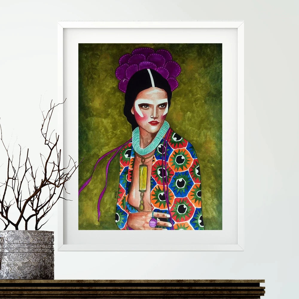 Framed artwork of a person with colorful clothing and headpiece on a white wall.