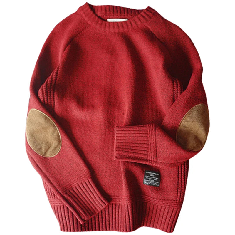 Red sweater with brown elbow patches on a white background
