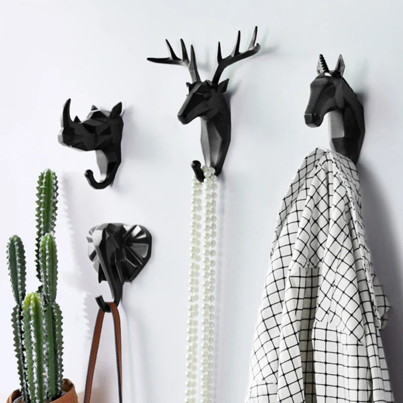 Decorative animal head resin wall hook for hanging keys, coats, bags and hats, available in multiple animal designs and colours.