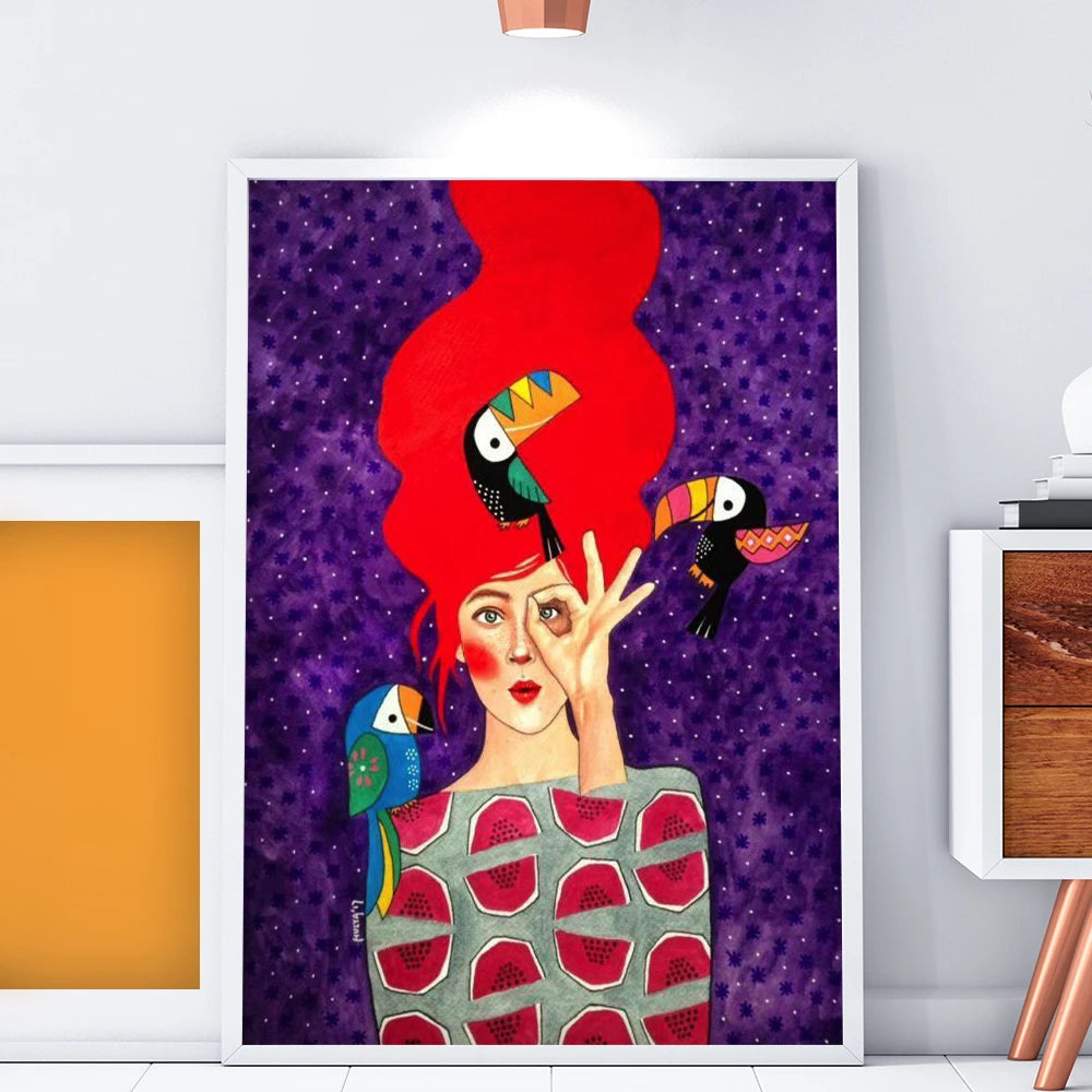 Framed artwork of a woman with red hair and birds, on a purple background, in a modern interior setting.