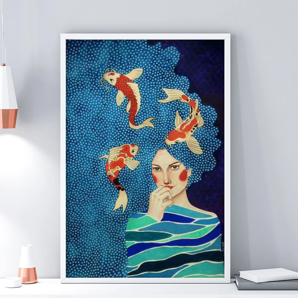 Framed artwork of a woman with koi fish in her hair against a blue dot-patterned background.