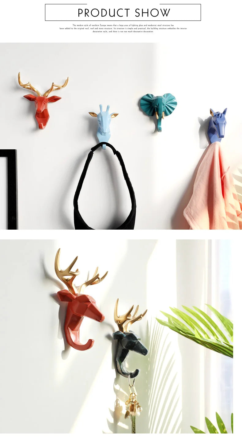 Set of colorful animal-shaped wall hooks on a white background