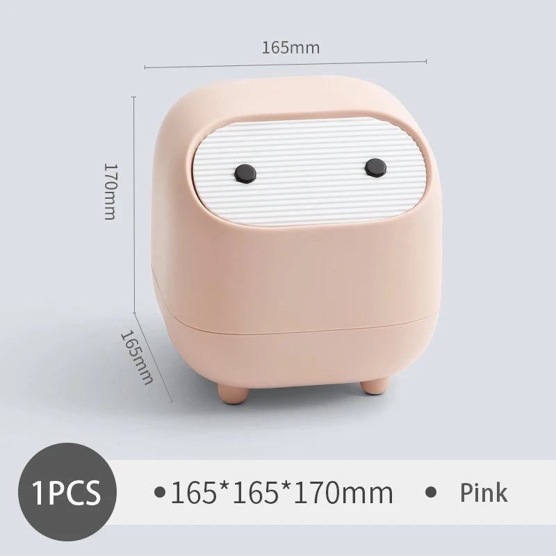 Pink speaker with dimensions on a light gray background
