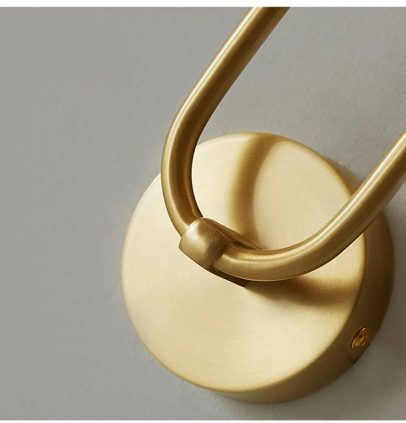 Nordic brass double LED wall lamp with two vertical acrylic light tubes mounted on a minimalist round base