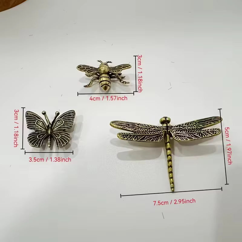 Three decorative pieces shaped like a bee, butterfly, and dragonfly, shown on a white background with red dimension labels and measurement lines.
