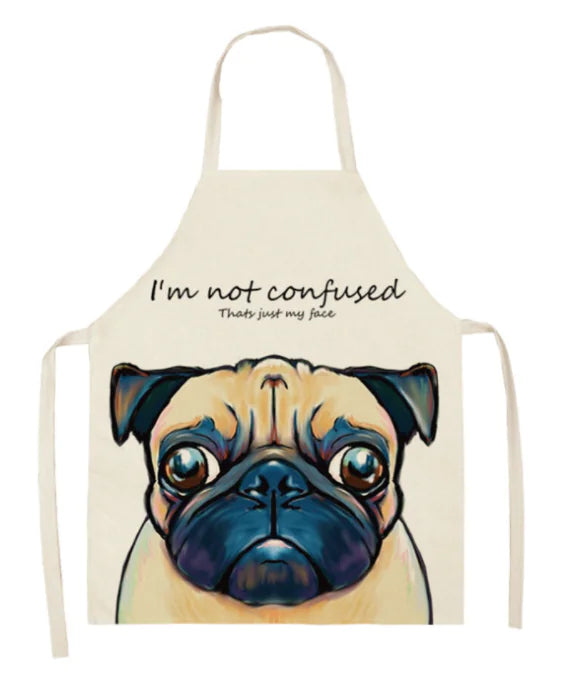 Apron with a pug design and text 'I'm not confused, that's just my face' on a white background