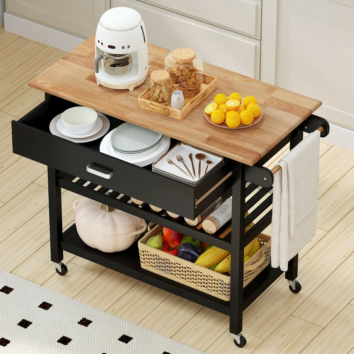 Kitchen cart with wooden top and black base, containing kitchen items.