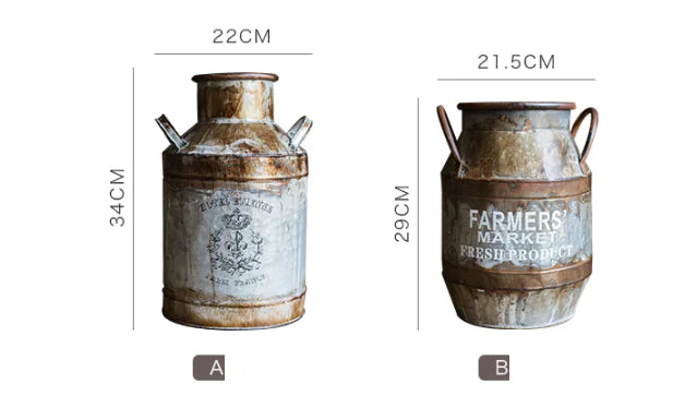 Two rustic metal containers with dimensions labeled on a white background