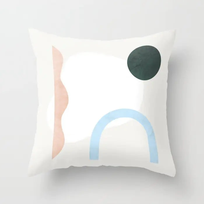 Decorative pillow with abstract shapes on a white background