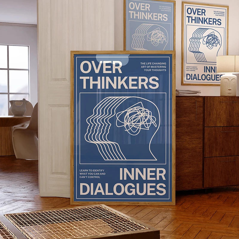 Framed poster titled 'Over Thinkers: Inner Dialogues' in a room setting.