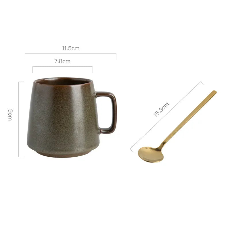 Brown ceramic mug and gold spoon with measurements on a white background