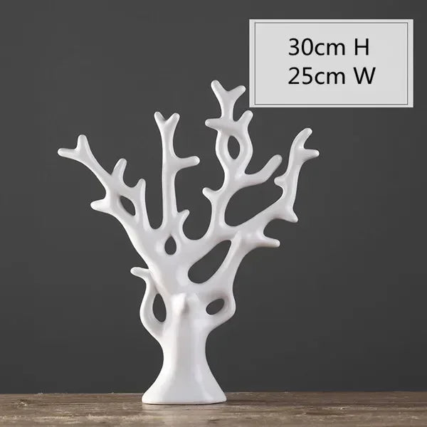 White coral-like decorative piece on a wooden surface with measurements displayed.