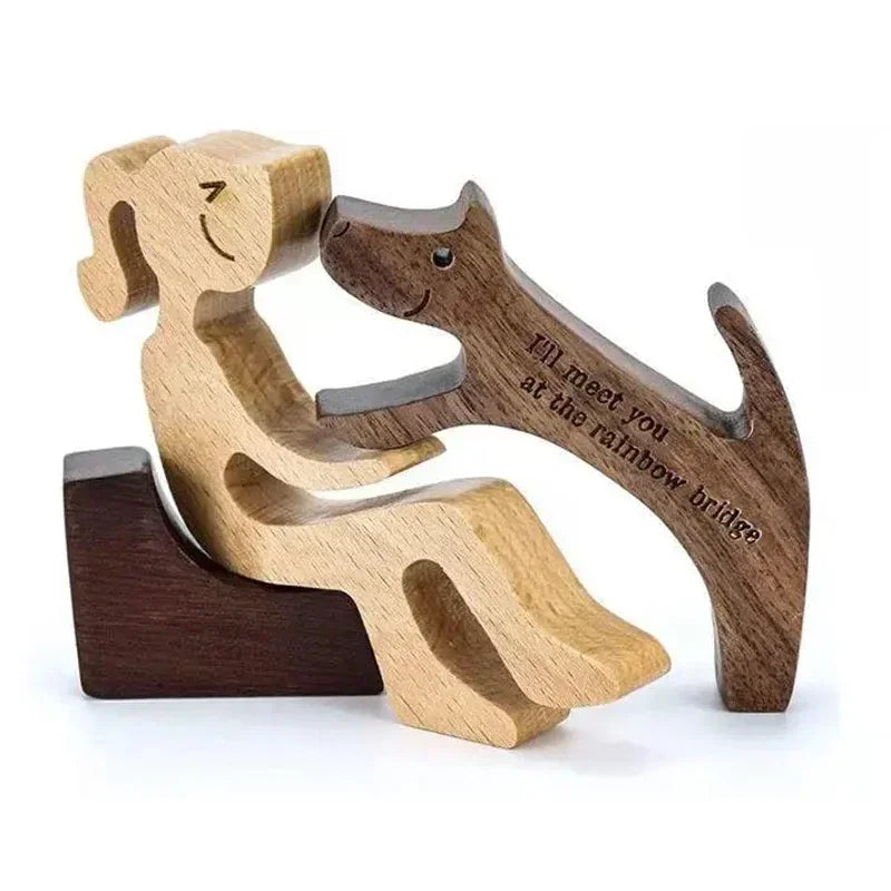 Wooden figurine of a dog and cat embracing with a message on a white background