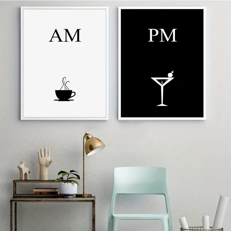 Two framed prints on a wall with 'AM' and 'PM' and corresponding icons, below a gold lamp and green chair.