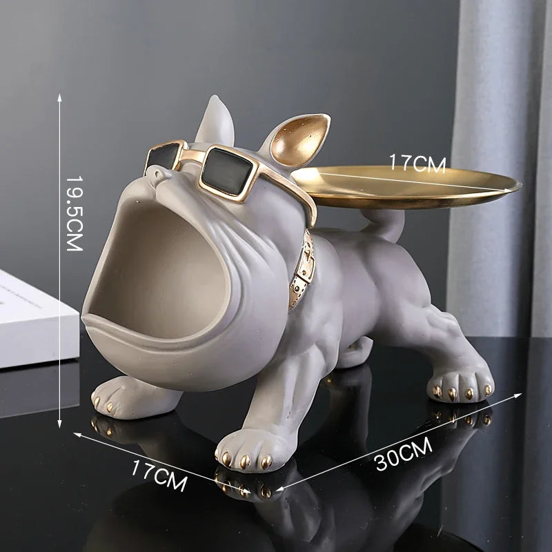 Bulldog-shaped table with a tray on a dark surface, featuring dimensions.
