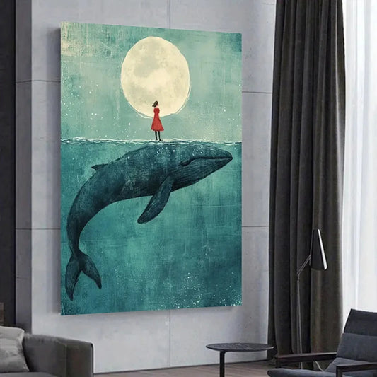 Canvas print of a woman in a red dress standing on a whale's back under a large moon, hanging on a wall.