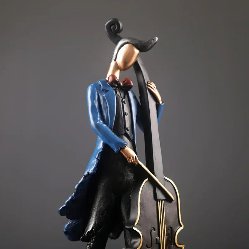Statue of a person in formal attire playing a cello against a gray background