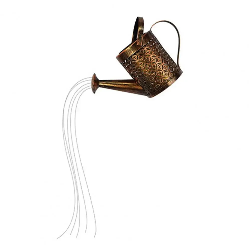 Decorative metal watering can with a long spout on a white background