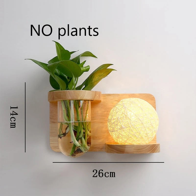 Wooden wall shelf with a glass vase and spherical light fixture, dimensions indicated.