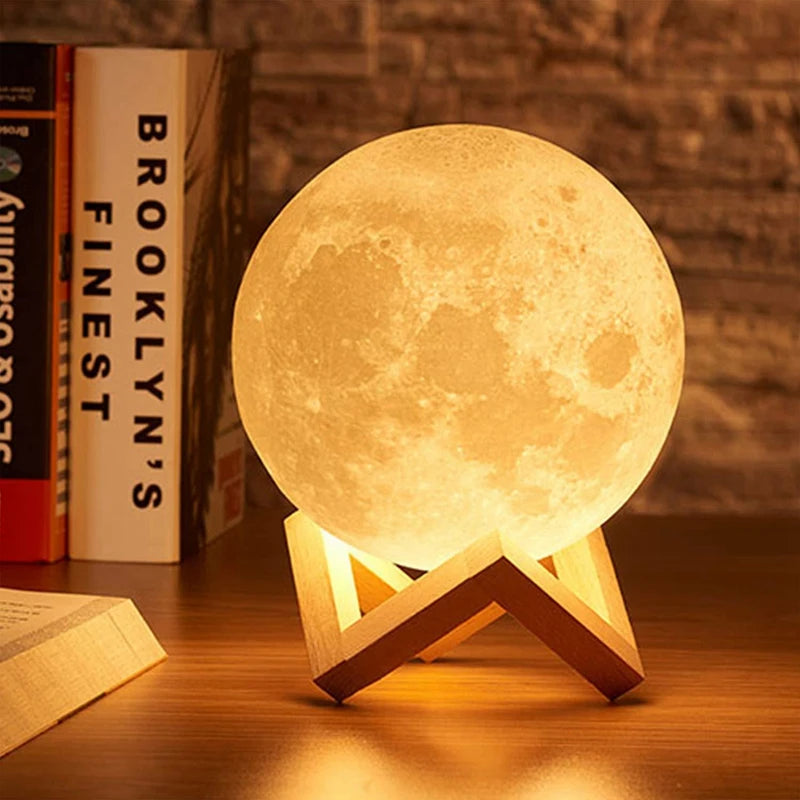 LED moon night light with stand showing warm white and colour changing options