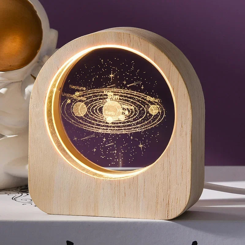 Wooden lamp with solar system design on a purple background