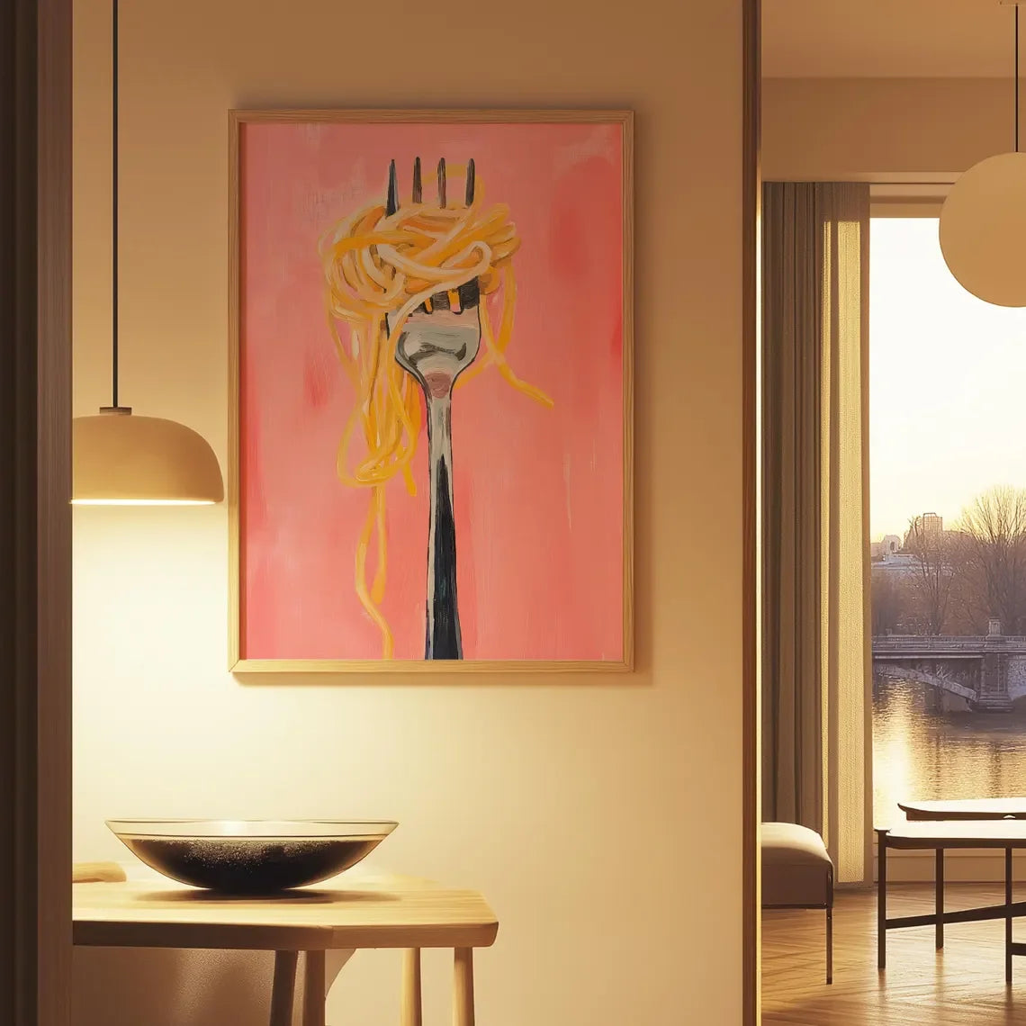 Framed artwork of a fork with spaghetti on a pink background in a room with a window view.