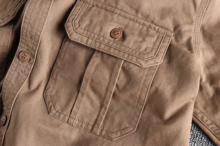 Close-up of a brown shirt with a pocket and buttons