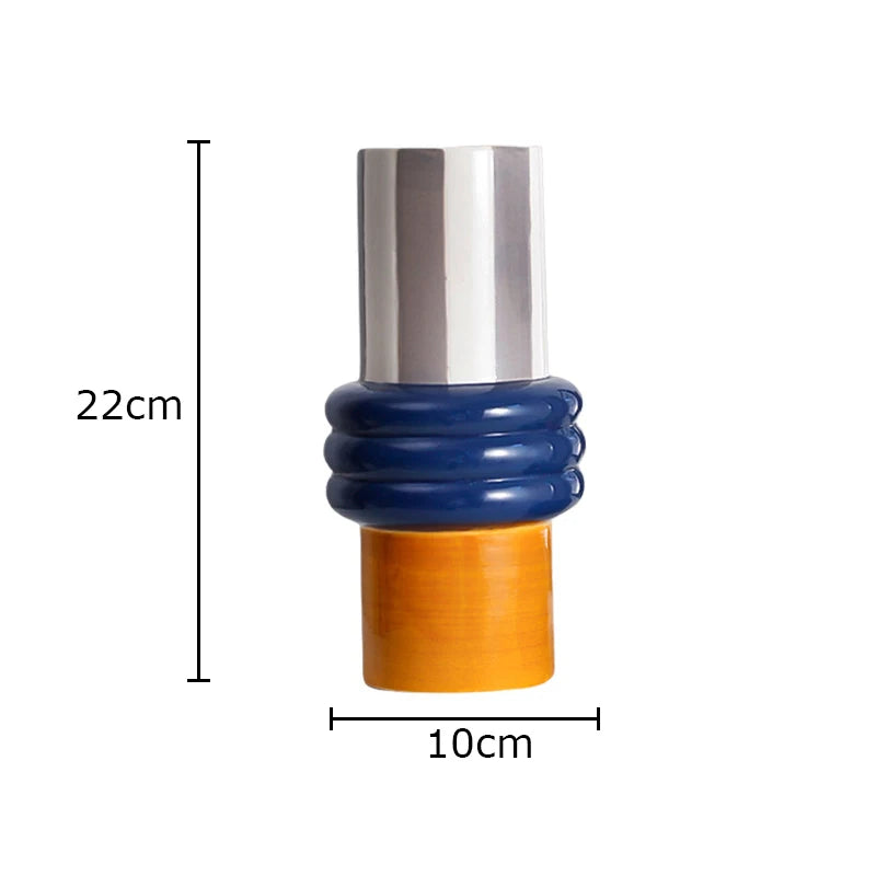 A cylindrical product shown on a white background with dimension lines indicating a height of 22cm and a width of 10cm. The product has a brushed silver top, a dark blue ribbed middle section, and a warm orange-brown bottom section.