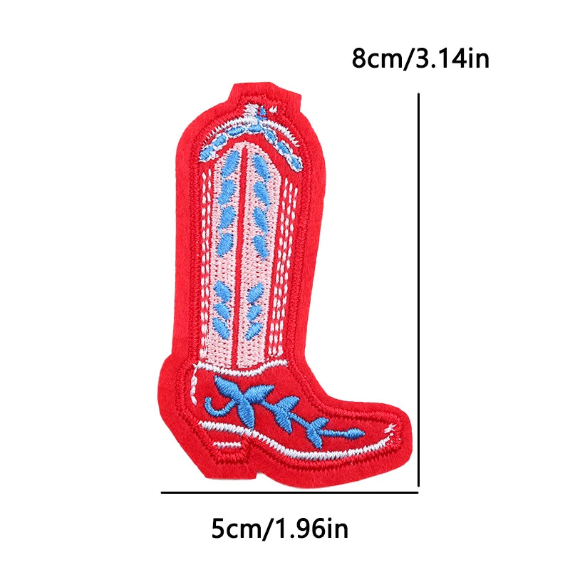 Red embroidered boot patch with blue details and measurements on a white background