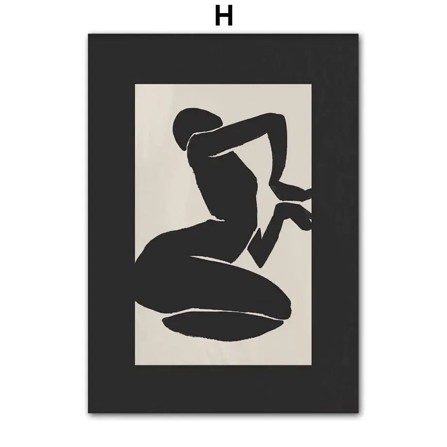 Silhouette of a person sitting on a pillow with a black frame and mat.