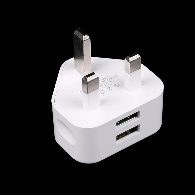 White plug adapter with multiple ports on a black background