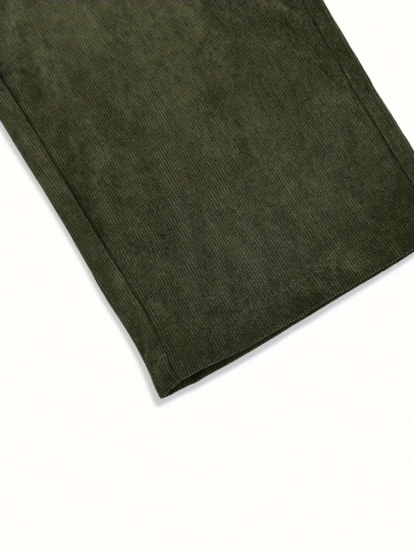 Dark green fabric on a white background