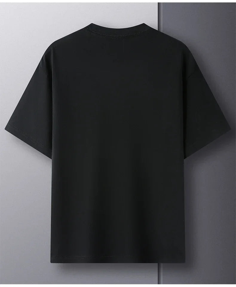 Black t-shirt on a plain background